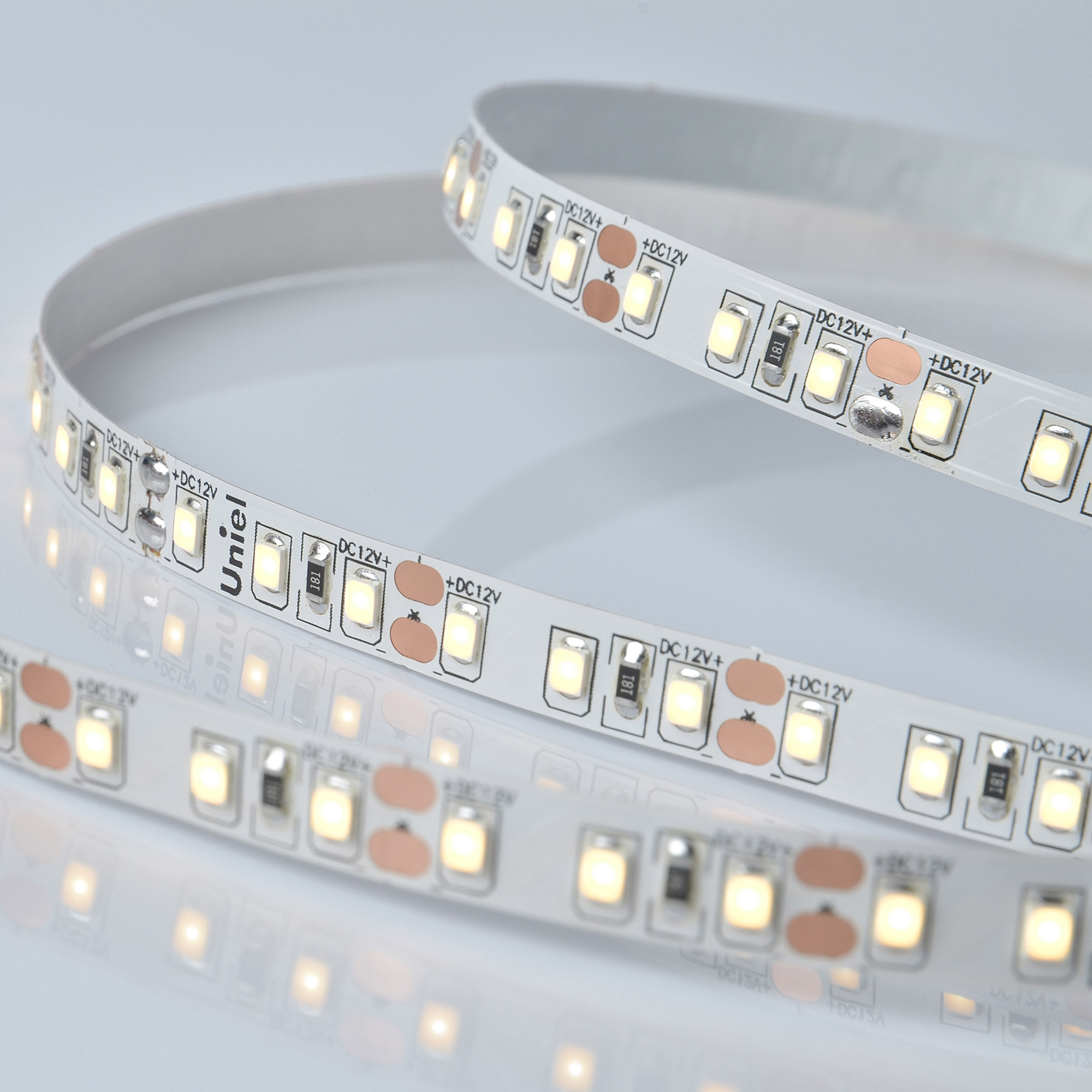 Лента светодиодная гибкая на самоклеящейся основе. ULS-M13-2835-120LED/m-8mm-IP20-DC12V-9,6W/m-5M-3000K PROFI Катушка 5 м. в герметичной упаковке. Теплый белый свет(3000К)