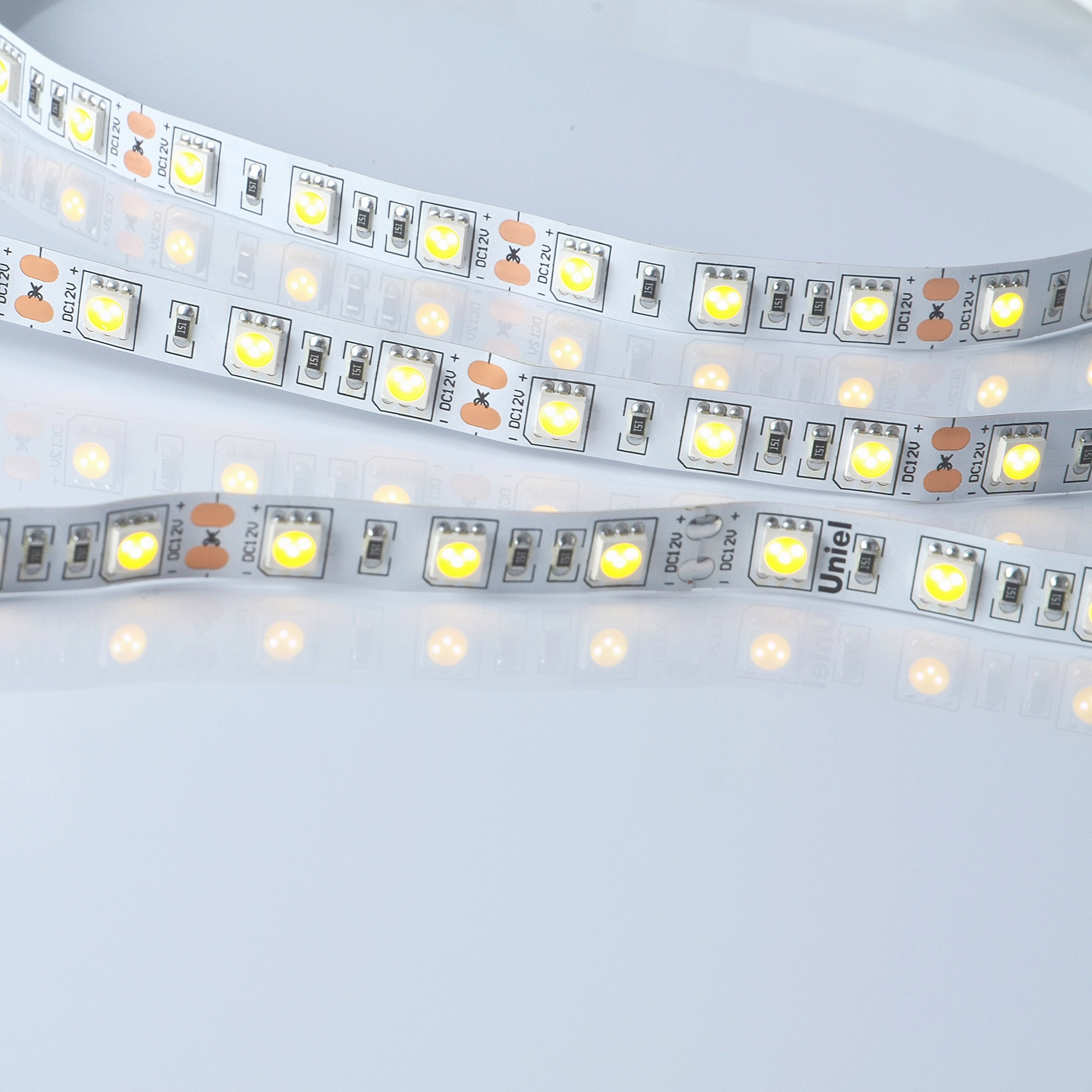 Лента гибкая светодиодная на самоклеящейся основе. ULS-M25-5050-60LED/m-10мм-IP20-DC12V-14,4W/m-5м-3000K PROFI Катушка 5м. в герметичной упаковке. Теплый (3000К)