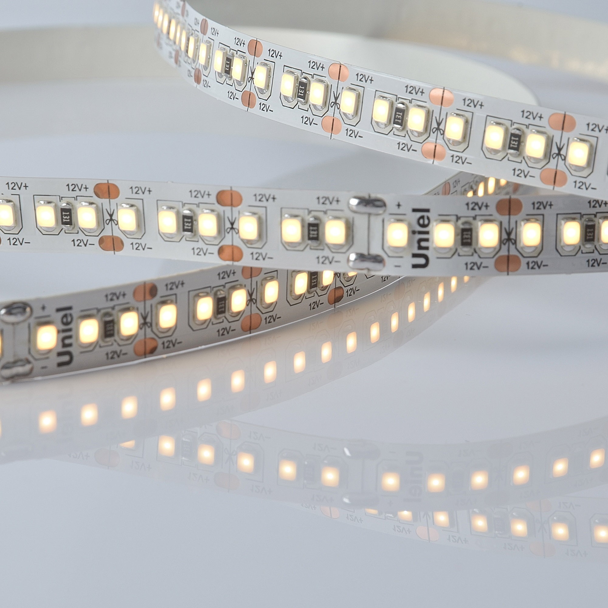 Лента светодиодная гибкая на самоклеящейся основе 17Вт/м 12В 3000K IP20 180LED/м катушка 5м. в герметичной упаковке