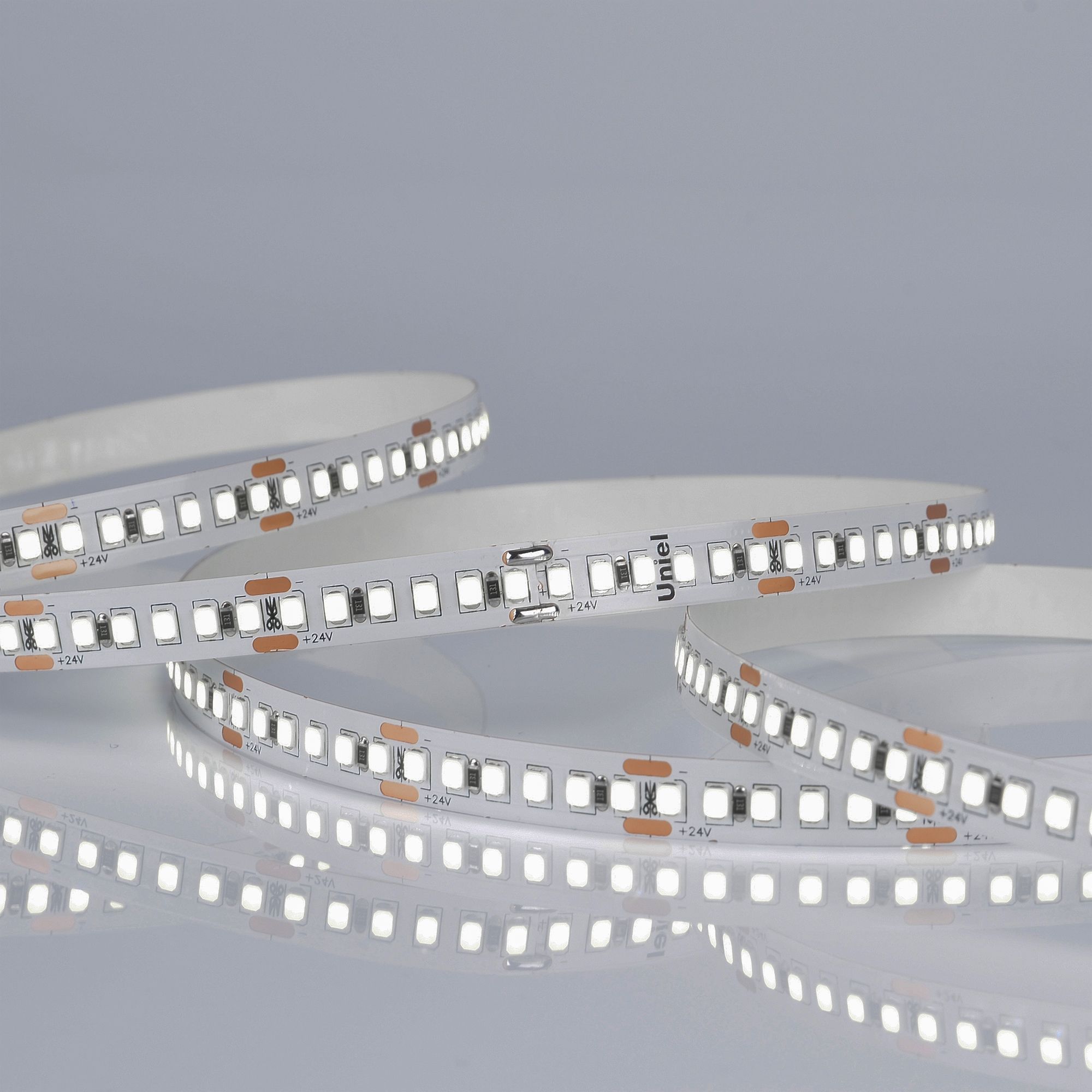 Лента светодиодная гибкая на самоклеящейся основе. ULS-2835-180LED/m-10mm-IP20-DC24V-17W/m-5M-6500K Катушка 5м. в герметичной упаковке. Дневной свет (6500K)