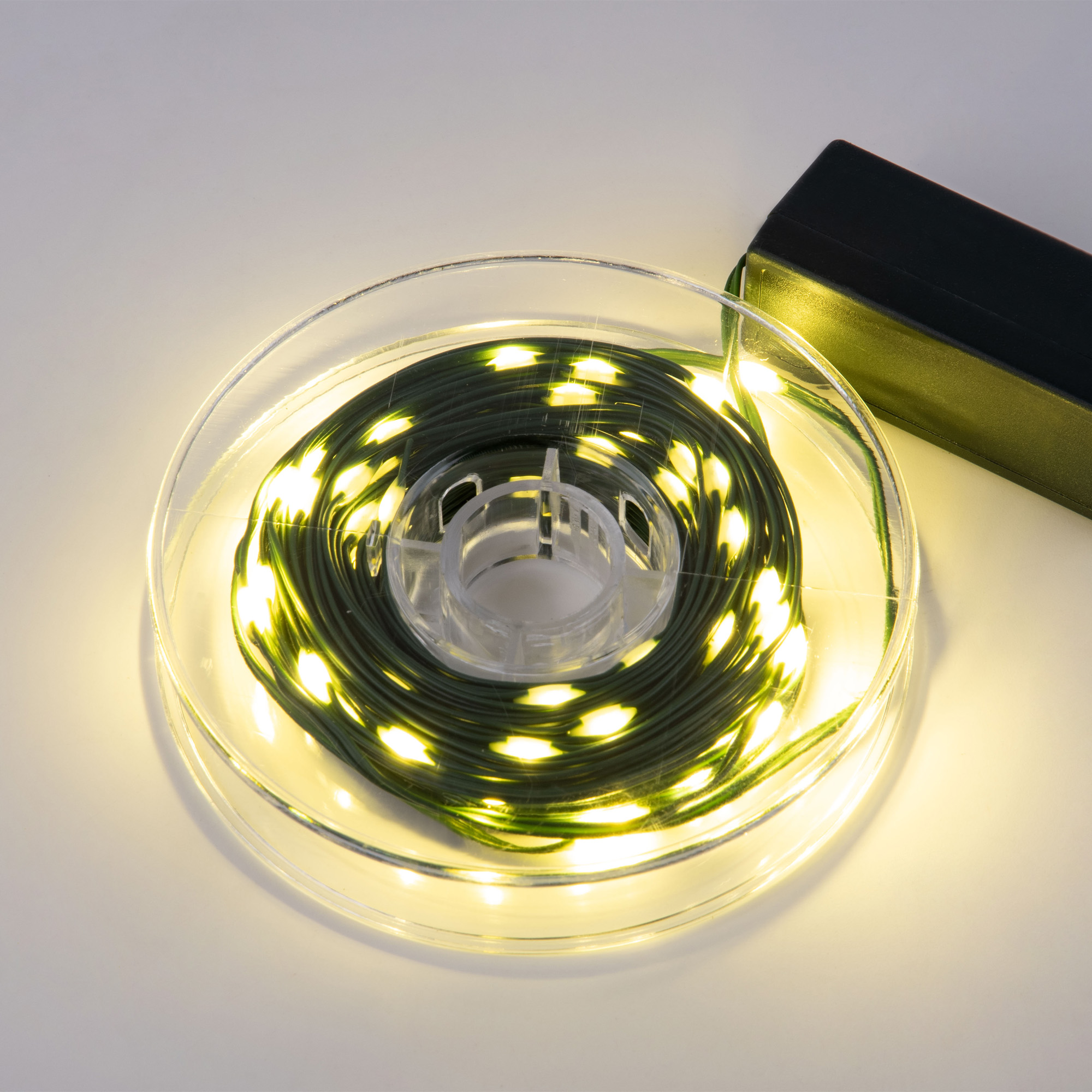 Гирлянда светодиодная Полоса 10 м 100 светодиодов теплый белый свет зеленый провод ULD-S1000-100/DGA WARM WHITE IP20 DEW BAND