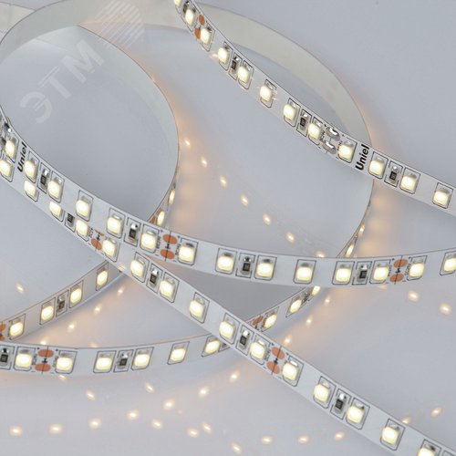 Лента гибкая светодиодная на самоклеящейся основе. ULS-2835-120LED/m-8мм-IP20-DC24V-9,6W/m-5м-3000K Катушка 5 м. в герметичной упаковке. (3000K) - фото 4